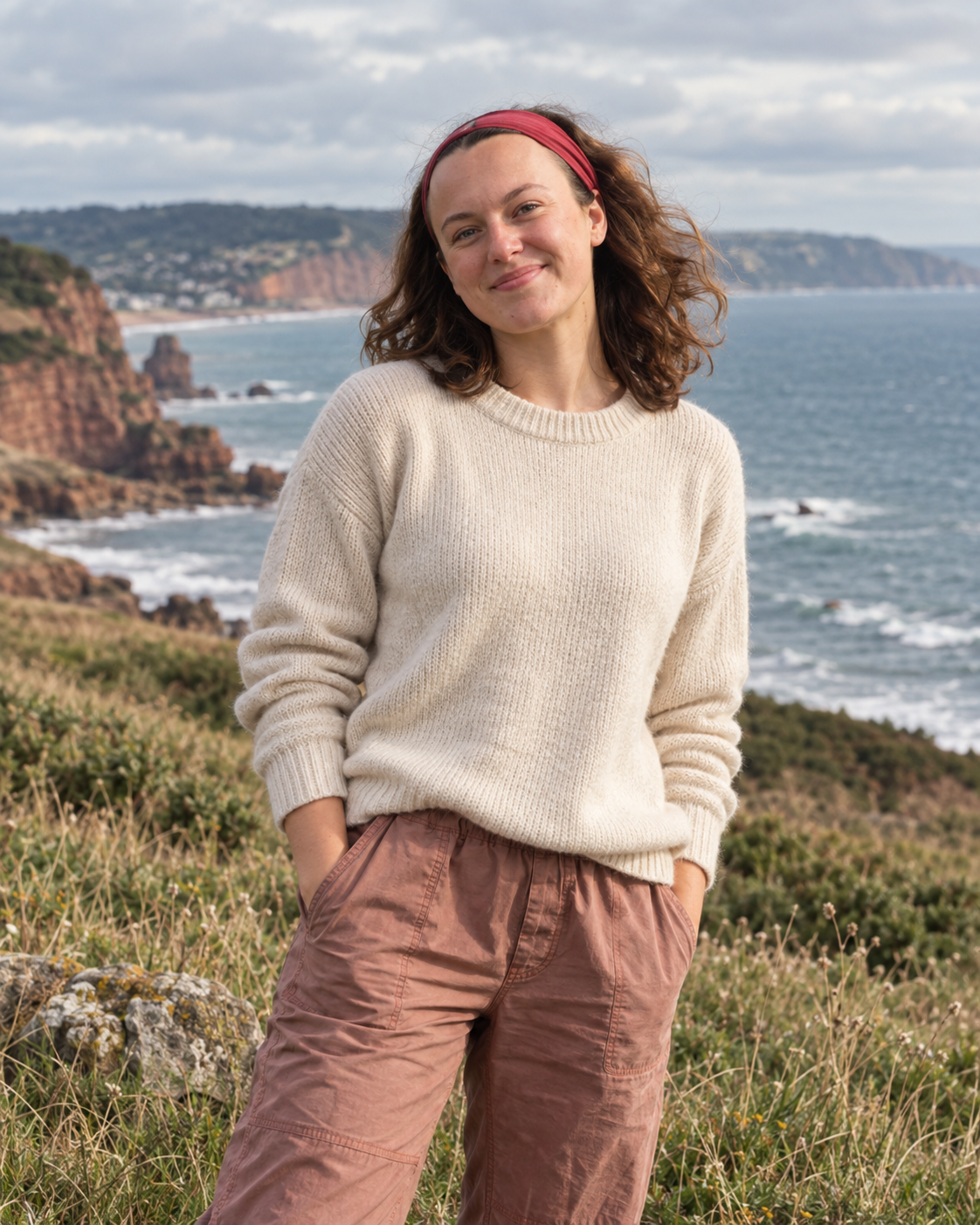 Grace standing by the coast