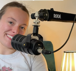 Grace recording with a microphone